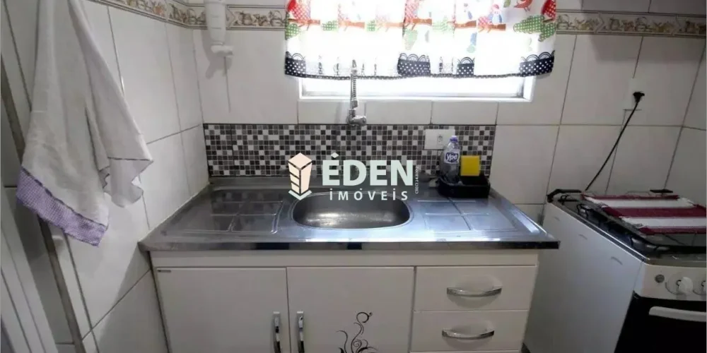 Fachada de sobrado de dois andares com garagem no bairro Jardim Éden, Sorocaba